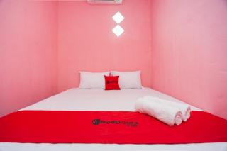 RedDoorz near Simpang Bandara SMB II - 7