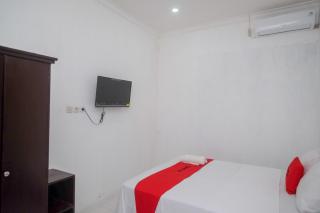 RedDoorz near De La Salle Manado - Manado - 4
