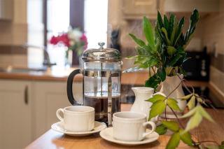 Tower Barn Cottage, Castle Carrock, a luxurious characterful cottage with hot tub and views - 1