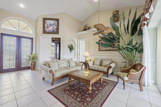 Large waterfront home with all-day sun on pool - 9