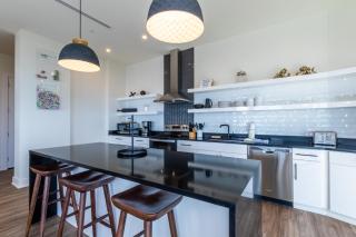 Elegant 4 BR Beachfront, Luxury Condo with Rooftop Pool Next to the Hangout - Gulf Shores - 1
