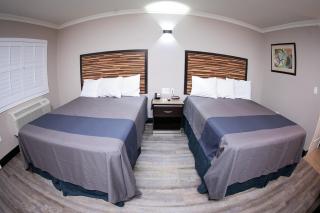 Diamond Bell Inn & Suites - Bell - 9