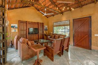 SaffronStays Terra Soul - 3BR eco-luxury pet-friendly pool villa with gazebos, bar & fish pond near Imagica & Pali Temple - 1