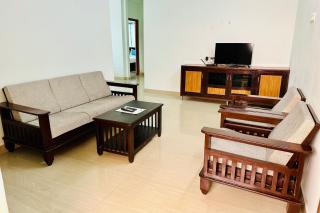 TrueLife - SRS Residency - 2BHK AC apartments for families - 10 minutes to Alipiri gate by direct flyover - Walk to PS4 pure veg restaurant - Fast WiFi, Kitchen, Android TV - 250 Jio Channels - Easy access to Airport, Railway Station and to all Temples - Tirupati - 9