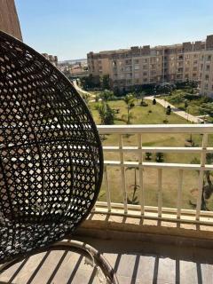 Apartment view wide garden at Madinaty - 2