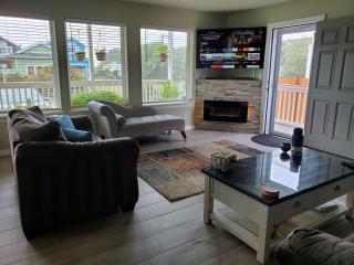 Sunkissed 3BR beach getaway - dog-friendly fenced yard, firepit, glimpse ocean views, near beach access, sleeps 8 - 1