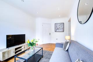 Stylish Two Bedroom Apartment With Free Parking! - 1