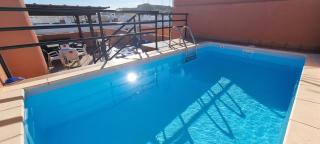 Homes of Spain, Apartamentos Paraiso Vera Playa, Ed Tahiti, Atico F de 2 dormitorios con piscina privada en solárium y barbacoa, pie de playa - Vera - 4