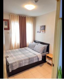 One spatial iloilo city two bedroom condo with free Netflix wifi pool and Gym - 1