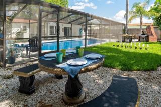 Tranquil Times a Serene 3BR Close to RJ Stadium with Screened Heated Pool, Outdoor Kitchen and Yard Chess - 4