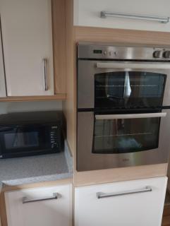 E31 is a 2 bedroom 6 berth caravan with large decking and close to beach on Whitehouse Leisure Park This is a pet free caravan - Abergele - 1