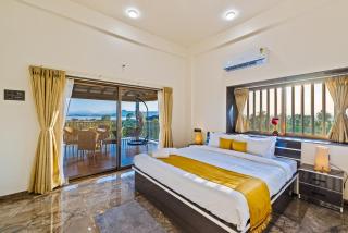 SaffronStays Mango Lakeview Villa - 3BR pool villa amid mango farms with Gangapur Dam views, deck & games - 5