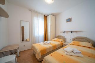 Seaside Serenity: 2-Bedroom Apartment with Boka Bay View - 2