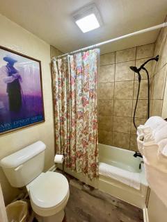 Lake view queen Guest Room with two queens, sleeper sofa and deck overlooking Lake Ouachita, Hotel Room - Mount Ida - 1