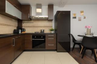 Family Apartment near PGE Narodowy by Noclegi Renters - 7
