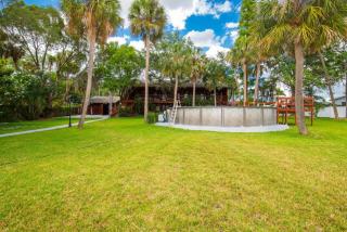 Waterfront 6BR Oasis with Pool, Gym, and Huge Dock - 6