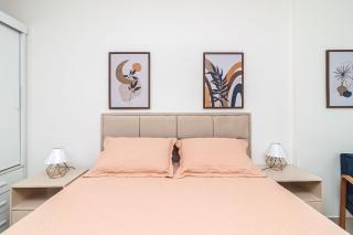 Apartamento Aconchegante e Elegante com Ar-Condicionado, Piscina, Garagem e Varanda Gourmet a 3 min da Praia - 1