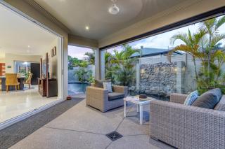 Luxury resort style villa pool by Custom Bnb Hosting - Pelican Waters - 3