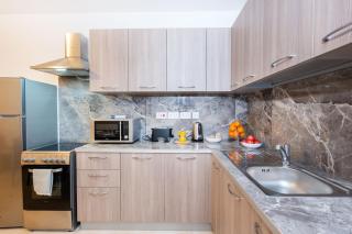 Islet Promenade Seafront Family Apartment with 2 balconies by Getawaysmalta - St Paul's Bay - 2