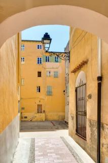 Between the roofs of Menton old town and the sea - 5