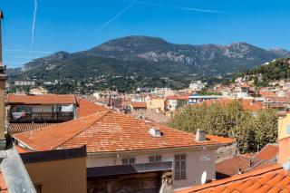 Between the roofs of Menton old town and the sea - 1
