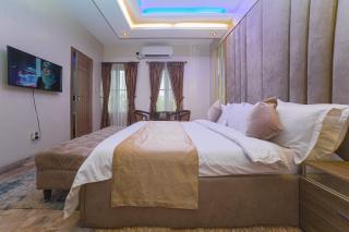 God's Touch Apartments Signature - 3