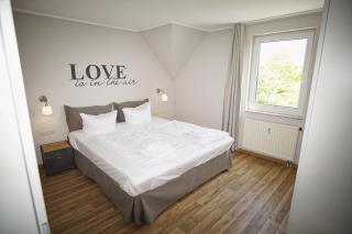 strandnah mit Balkon, gratis Nutzung vom AHOI Erlebnisbad und Sauna in Sellin - Strandhaus Mönchgut FeWo16 - Lobbe - 3