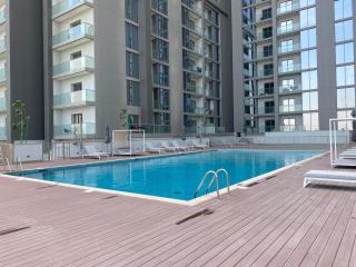 Beautiful 1BR - Close to Downtown with Pool and Gym - Dubai - 9