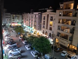 Comfort Hub Modern 2BR Apartments, prime location,Netflix WiFi - 1