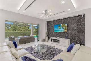 Modern home with outdoor kitchen and steps to beach - 7