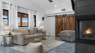 An Enchanted Hideaway outdoor fireplace hot tub - 8