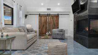 An Enchanted Hideaway outdoor fireplace hot tub - 4