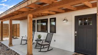 An Enchanted Hideaway outdoor fireplace hot tub - 5