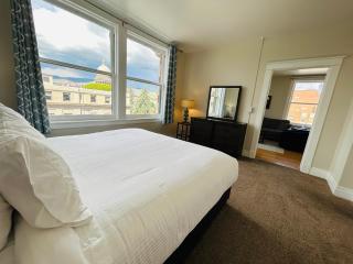 Downtown Digs-View of the City! Stay above local restaurants and nightlife, posh amenities heated toilet seat, oversized rain shower head in glass shower, in-unit laundry, one garage parking spot - 7