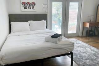 Treehouse is a Quaint 2 BR in an Up-and-Coming Part of Town, Pet Friendly with Fenced Yard and lounge area that is Close to Downtown Tampa - 1
