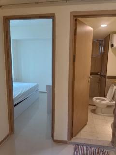 RoomQu at Apartment Amazana Serpong Residence - 9