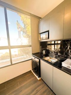 central apartment for rent 27 - Umm Uthainah - 1