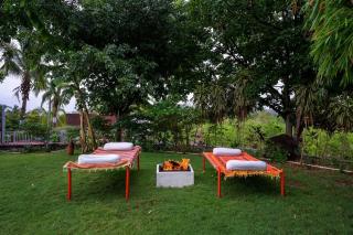 Kamal Baug by StayVista - A balinese villa with a pool, Open patios, Expansive lawn & Games - Shikrapur - 2