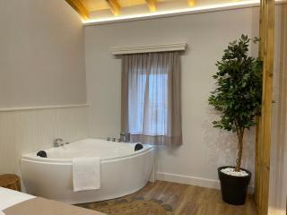 Goninos Jacuzzi Suite - Velonádes - 1