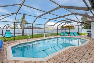 Large screened in lanai with electric heated pool, close to everything - Roelens Vacations - Cape Coral - 0