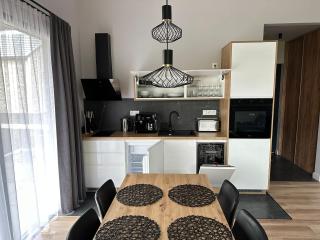 Domki Zdrojowe - Apartamentowe domki w centrum miasta - Parking - 1