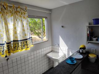 Ed Bertholi - Vista lateral do mar com garagem - 8