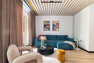 Family Apartment with a Sandbox on the Balcony in Kolobrzeg by Noclegi Renters - 1