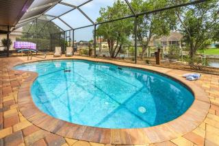 Gulf access, Heated Pool, outdoor kitchen, firepit & dock - Waterfront Paradise - Cape Coral - 0