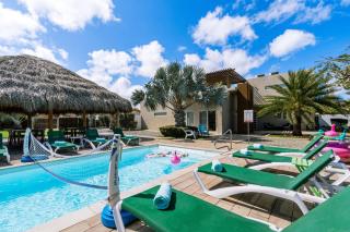 Koyari Modern Condos 9BR 7BA Sleeps 26 w/ Pool and Roof Deck - Palm-Eagle Beach - 0