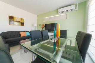 Koyari Modern Condos 9BR 7BA Sleeps 26 w/ Pool and Roof Deck - Palm-Eagle Beach - 1