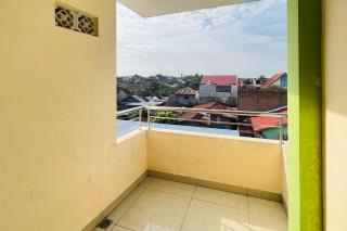 Teratai Residence Mitra RedDoorz - Medan - 4