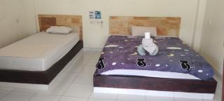 Amed Stop Inn Homestay, Rooftop Restaurant and Bar - Amed - 3