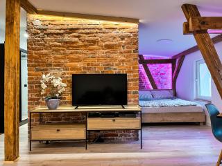 Brick and Wood Apartment - Bydgoszcz - 9