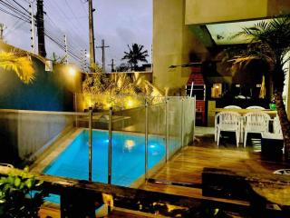 Casa agradável com piscina há 1 quadra da praia. - Bertioga - 0